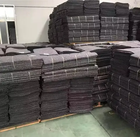 Stacked bales of finished felt in the warehouse