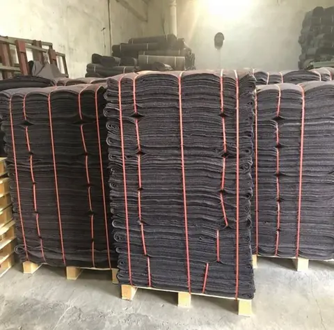 Pallets of felt sheets strapped for export dispatch