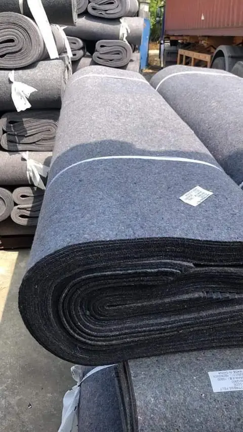 Large rolls of non-woven felt prepared for dispatch